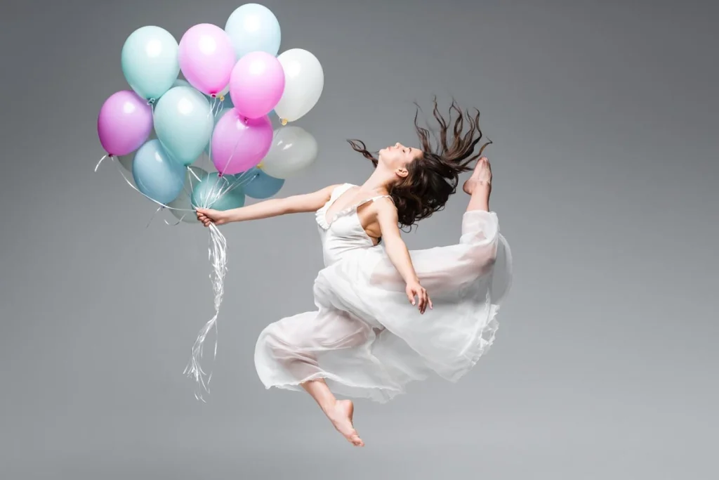 Silhouette of a woman rising into the sky, symbolizing defying gravity and breaking family patterns through Family Constellation therapy