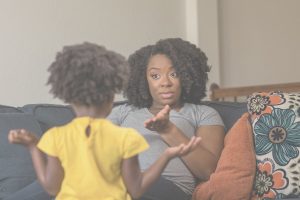 mother explaining something to child calm parenting communication
