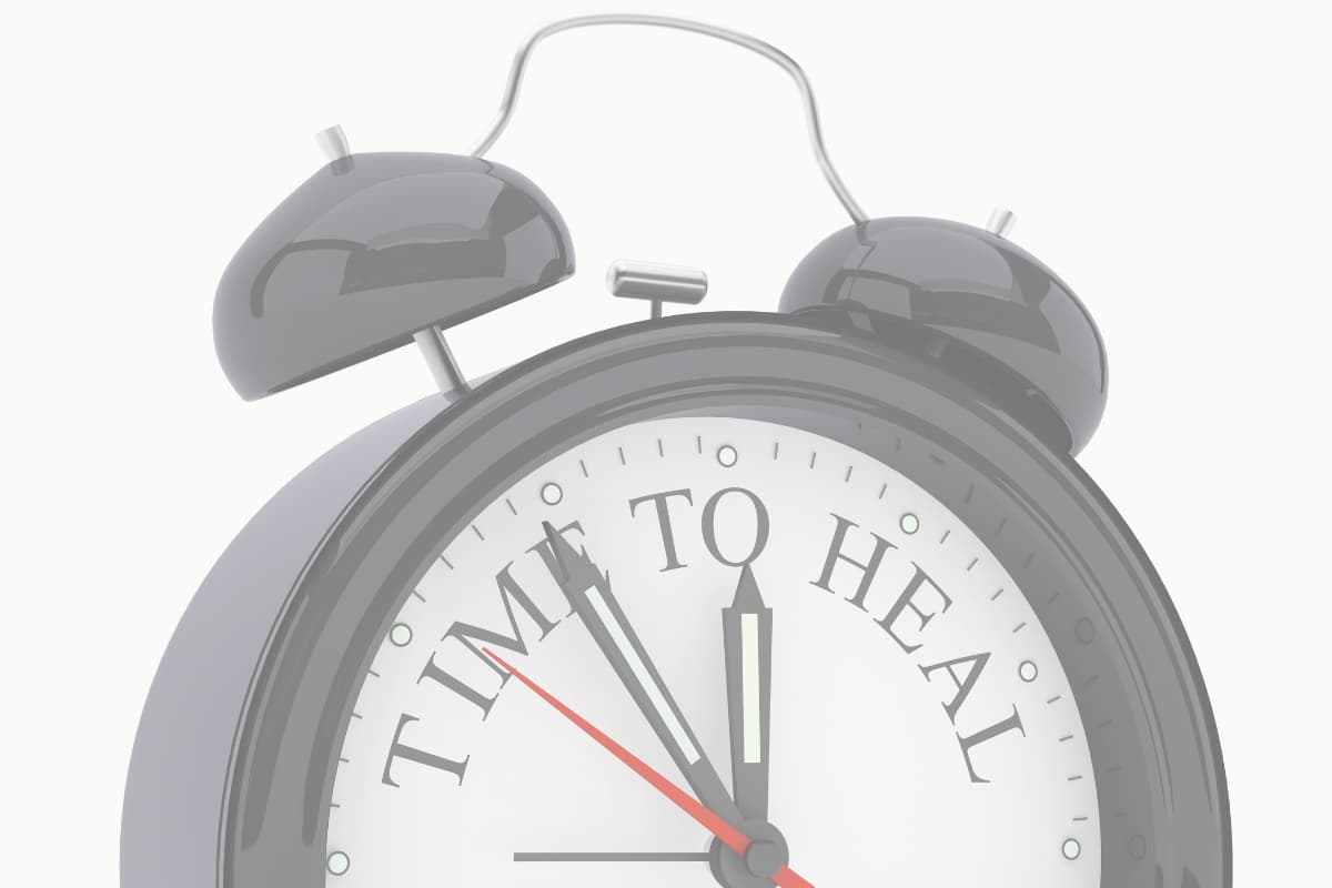 Alarm clock face reading "Time to Heal" symbolizing the moment to begin emotional healing and inner work